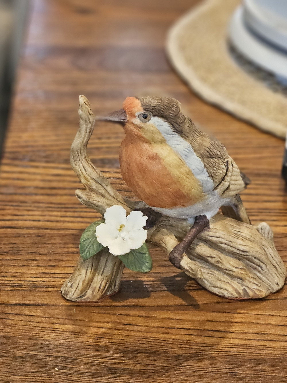 Decorative Orange and Brown Bird Figurine on Driftwood